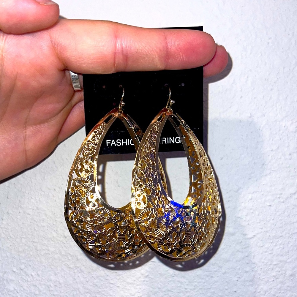 Golden hoop earrings dangle